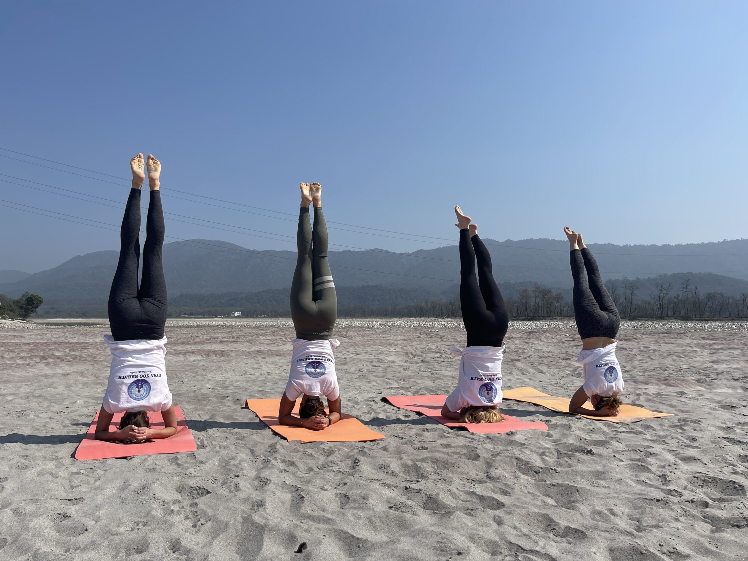 Students practising for 200 hour yoga teacher training in India